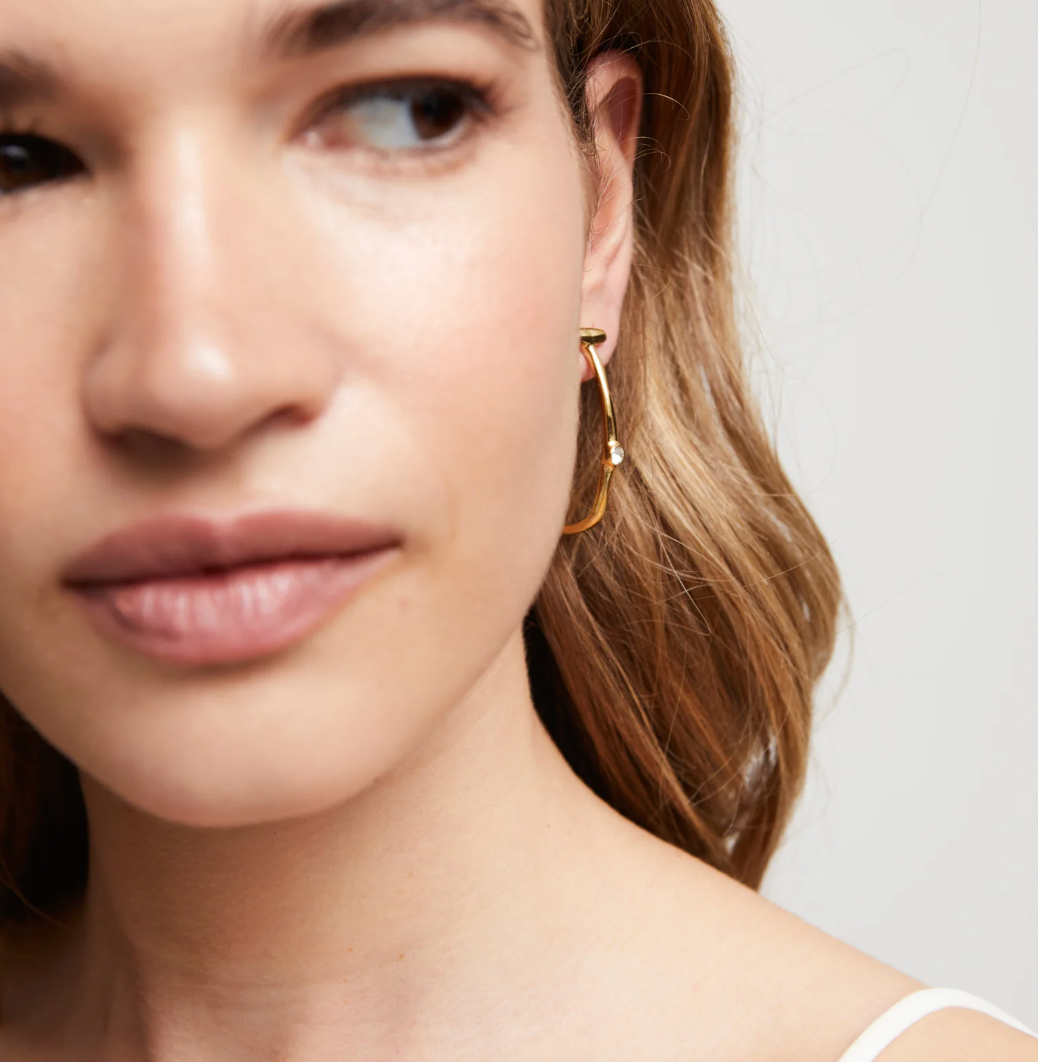 UNO DE 50 Hoop Gold earrings with white topaz