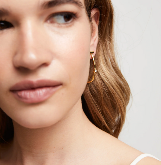 UNO DE 50 Hoop Gold earrings with white topaz