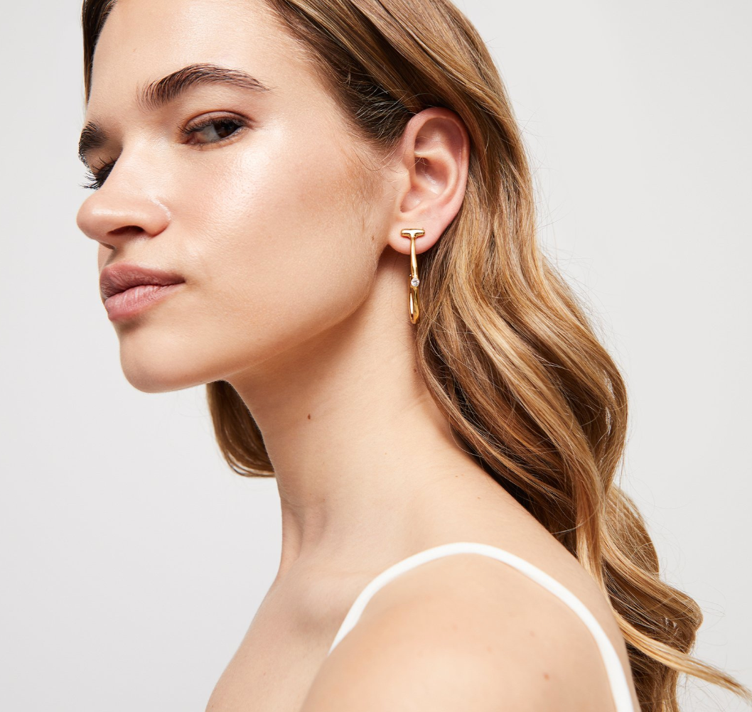 UNO DE 50 Hoop Gold earrings with white topaz