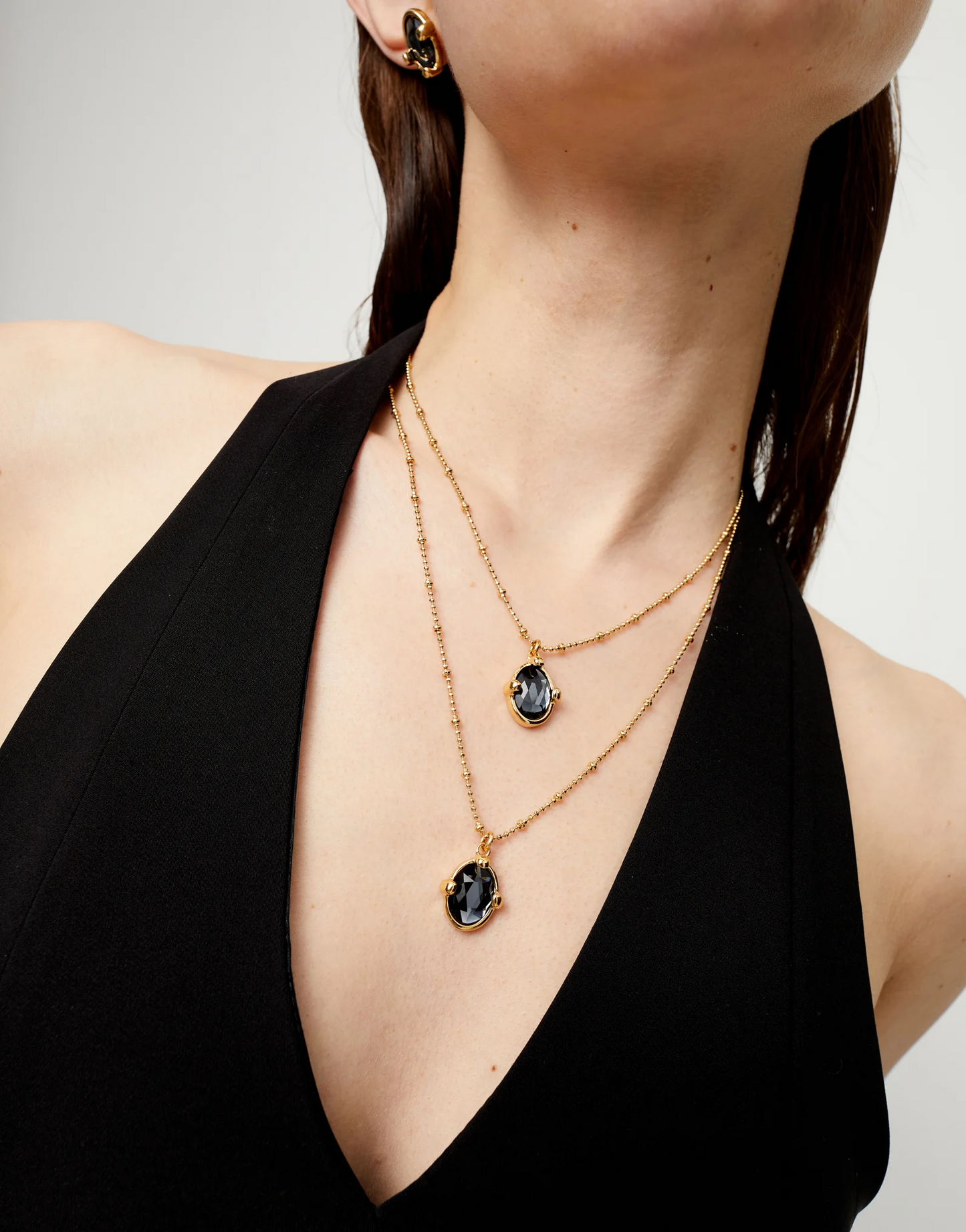 UNO DE 50 Multi strand necklace with two black oval faceted crystals