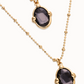UNO DE 50 Multi strand necklace with two black oval faceted crystals