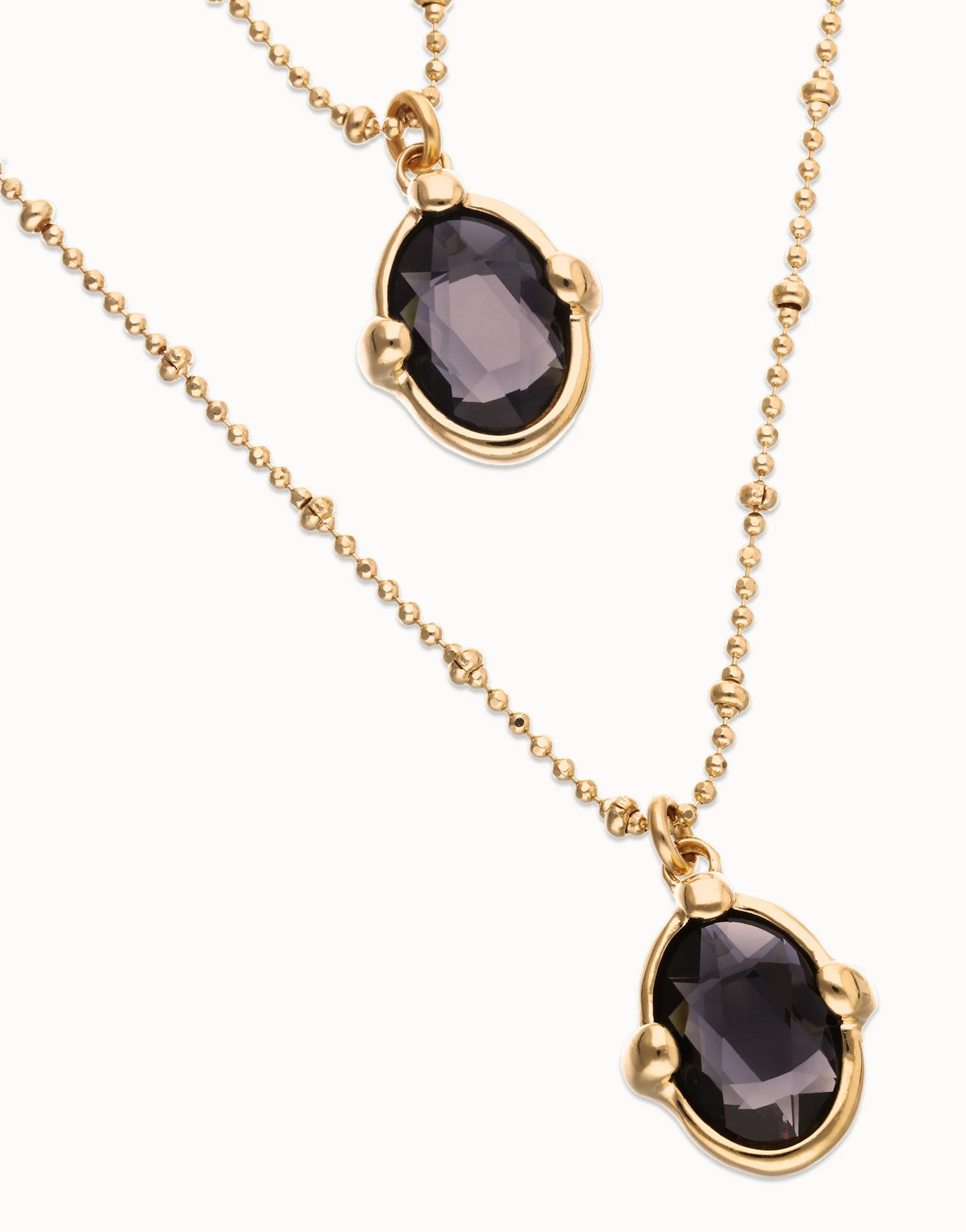 UNO DE 50 Multi strand necklace with two black oval faceted crystals