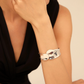 UNO DE 50 Olas Waves shaped bangle bracelet