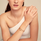 UNO DE 50 Bangle Gold  bracelet with central crystal