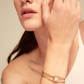 UNO DE 50 Bangle Gold  bracelet with central crystal