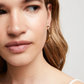 UNO DE 50 Hoop Gold earrings with white topaz
