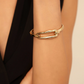 UNO DE 50 Amarrado Bangle bracelet with buckle