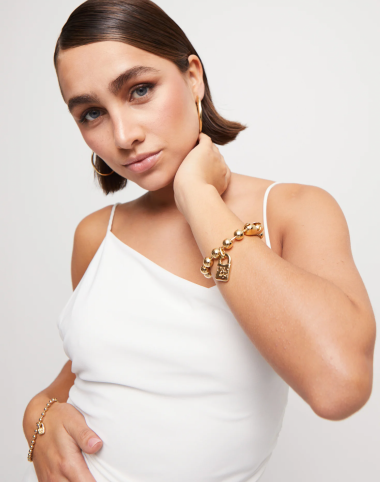 UNO de 50 Beaded bracelet with a padlock charm