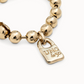 UNO de 50 Beaded bracelet with a padlock charm